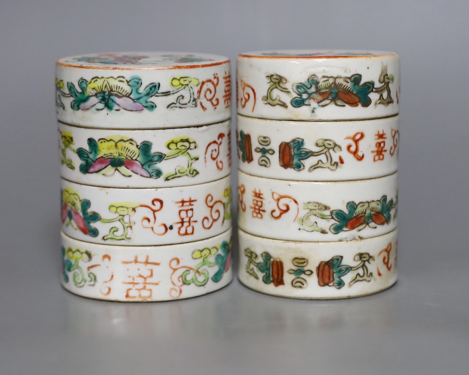 Two Chinese famille rose four tier, stacking boxes, early 20th century, 11cms high